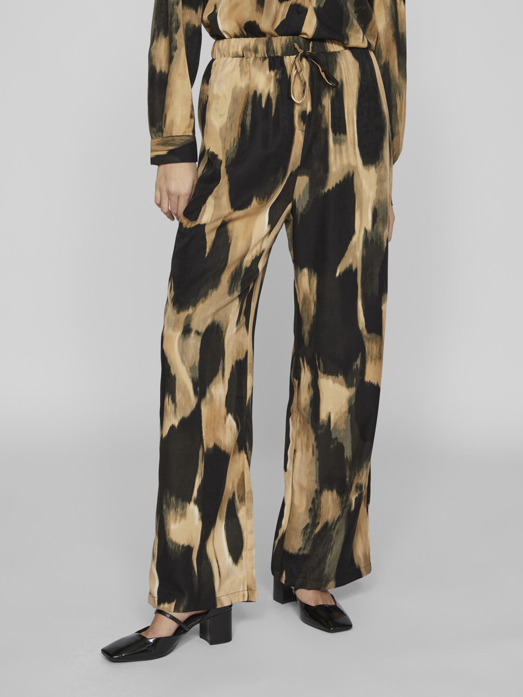 Pantalones discount estampado leopardo