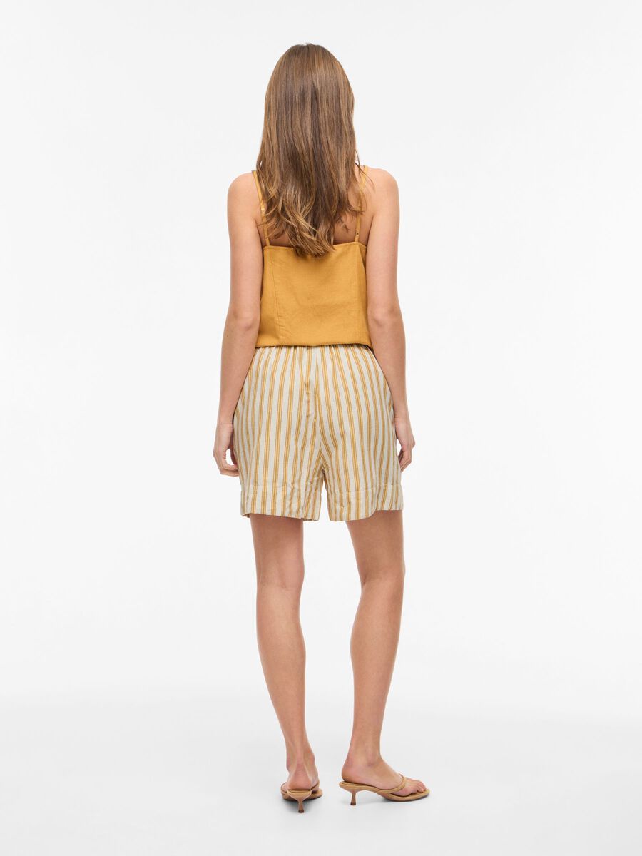 Product carousel image - MID WAIST SHORTS, Amber Gold | 2