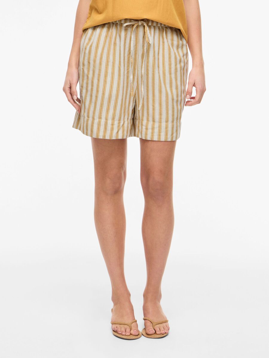 Product carousel image - MID WAIST SHORTS, Amber Gold | 1